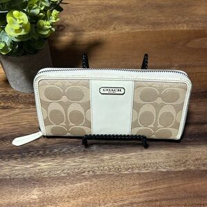 Coach cream and tan long zip around wallet.  GUC